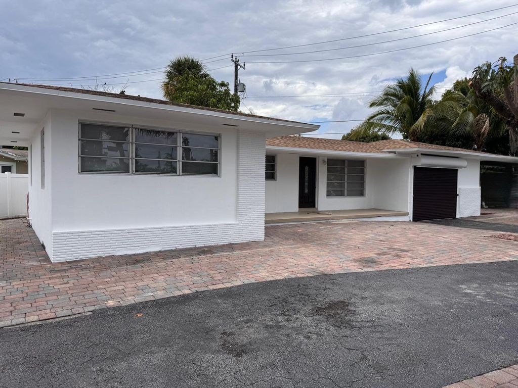 Photo of 11 NW 56th Street, Oakland Park, FL 33309 (MLS # B26021717)