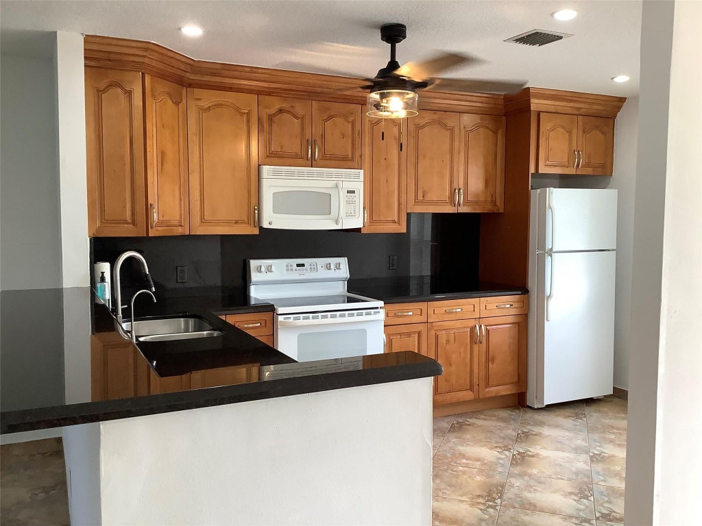 Photo of 6699 Moonlit Drive, Delray Beach, FL 33446 (MLS # B26089315)