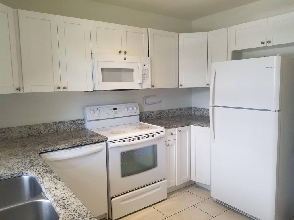 Photo of 617 Ixoria Avenue #11, Fort Pierce, FL 34982 (MLS # R10891856)