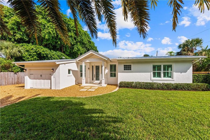 Completely renovated in 2014, this "Mini"-Mansion provides privacy and luxury in the desirable Old St. Lucie waterfront neighborhood. This home is nestled between 2 riverfront estates and combines a luxurious open concept with bungalow charm. Features include multiple large windows, vaulted cypress tongue & groove ceilings, porcelain tile, LED lighting, gourmet kitchen, Viking appliances, center Island, privatesetting and pool. Pool area features custom patio deck that includes real seashells in the concrete. Master bath features custom tile work, Victoria & Albert natural stone soaking tub, large walk in curb-less shower, and master closet with built-ins. Plantation shutters, lots of storage, pool cabana. CCTV system allows you to monitor the property while away. Complete property fencing with automated entrance gate creates a retreat feel while still only minutes from the beach, town, shopping, and all of the water sports you could ever hope for. 2014 renovation was a complete remodel of the property taking it back to the bare block and installing all new electrical, plumbing, HVAC (2units), roof, septic system, appliances, spray insulation, patio, impact windows and doors, kitchen, bathrooms, interior finishes, built-in cabinetry, and much more. The pool was also renovated in 2014 with an upgraded aggregate surface and a bench with whirlpool jets for relaxation. All pool and sprinkler equipment was replaced at this time as well. The quality and craftsmanship that went into this home has to be seen to be believed.
