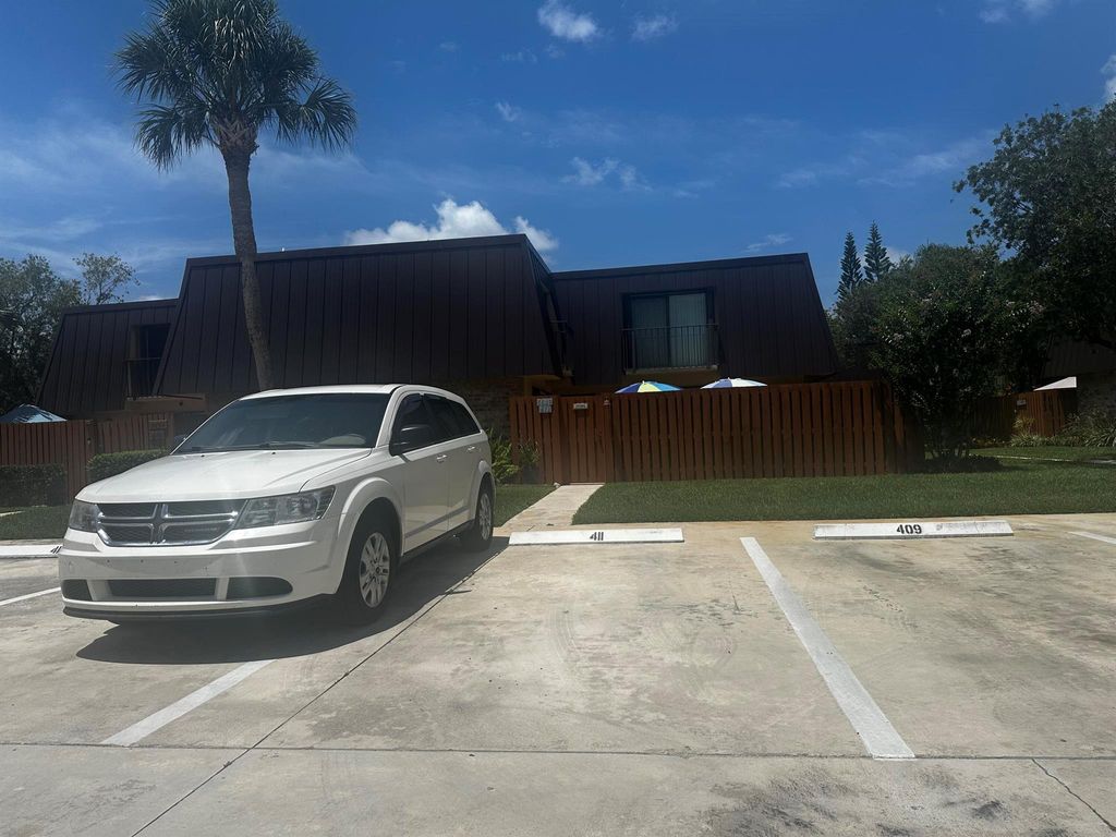 Photo of 5648 SE Windsong Lane #4-411, Stuart, FL 34997 (MLS # R11096615)