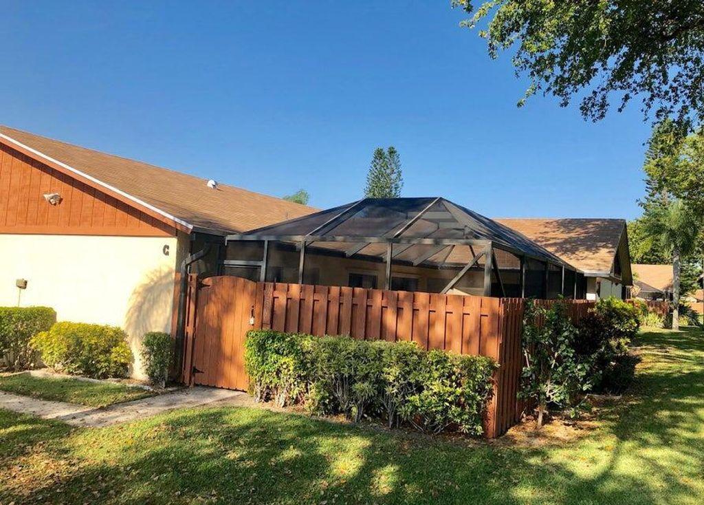 Photo of 1230 Summit Pl Circle #Unit C, West Palm Beach, FL 33415 (MLS # B26045540)