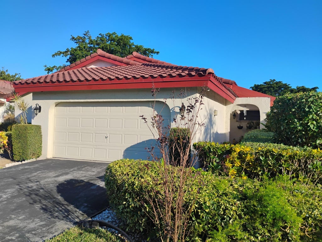 Photo of 5665 LAKEVIEW MEWS Drive, Boynton Beach, FL 33437 (MLS # B26055869)