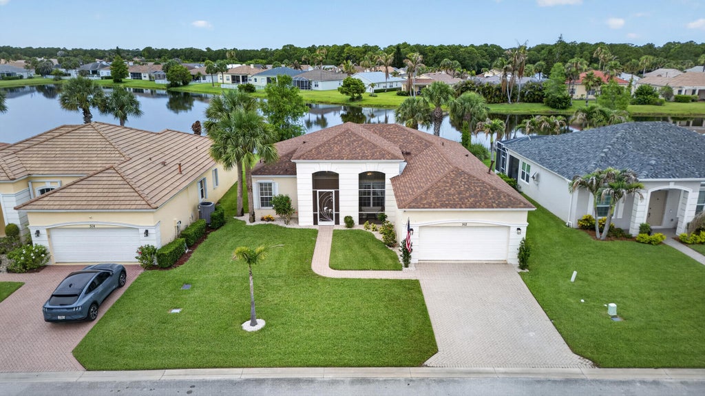 Photo of 512 SW Lake Manatee Way, Port Saint Lucie, FL 34986 (MLS # B26035895)