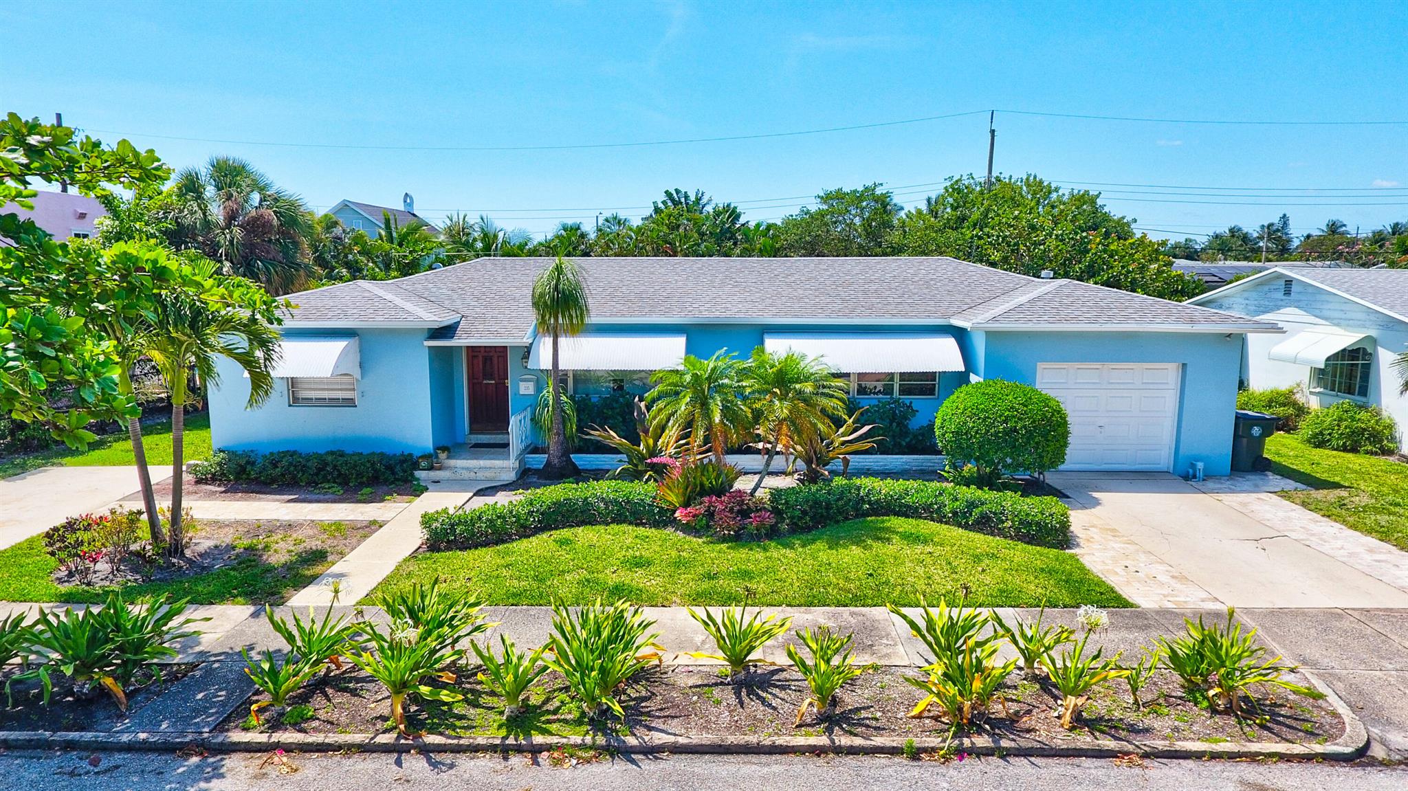 6+ Rooms over 1500 feet of living space! Huge fenced yard. Lake Worth Beach's Best....Historic College Park, a tranquil neighborhood with historic, beautiful landscaping and the best of Florida living. Pets case by case. This charming mid-century home on a very large lot, offers a gracious floorplan, hardwood floors, new granite kitchen, formal living and dining rooms, family room, separate office, 2 large bedrooms. 1 bath at bedrooms, 2nd in laundry, 1 plus car garage. Office can be 3 bedroom. The backyard is fully fenced and private with a wall of palms and large deck perfect for outdoor gatherings. The area offers shops, restaurants, live theatre, cafes, art galleries, public golf, a local beach and fishing pier. Enjoy The Flagler and Norton Museums, Four Arts, Dreher Zoo