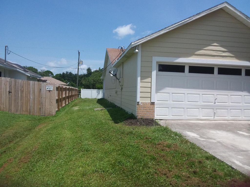 Photo of 161 SW Grimaldo Ter, Port Saint Lucie, FL 34984 (MLS # B26016758)