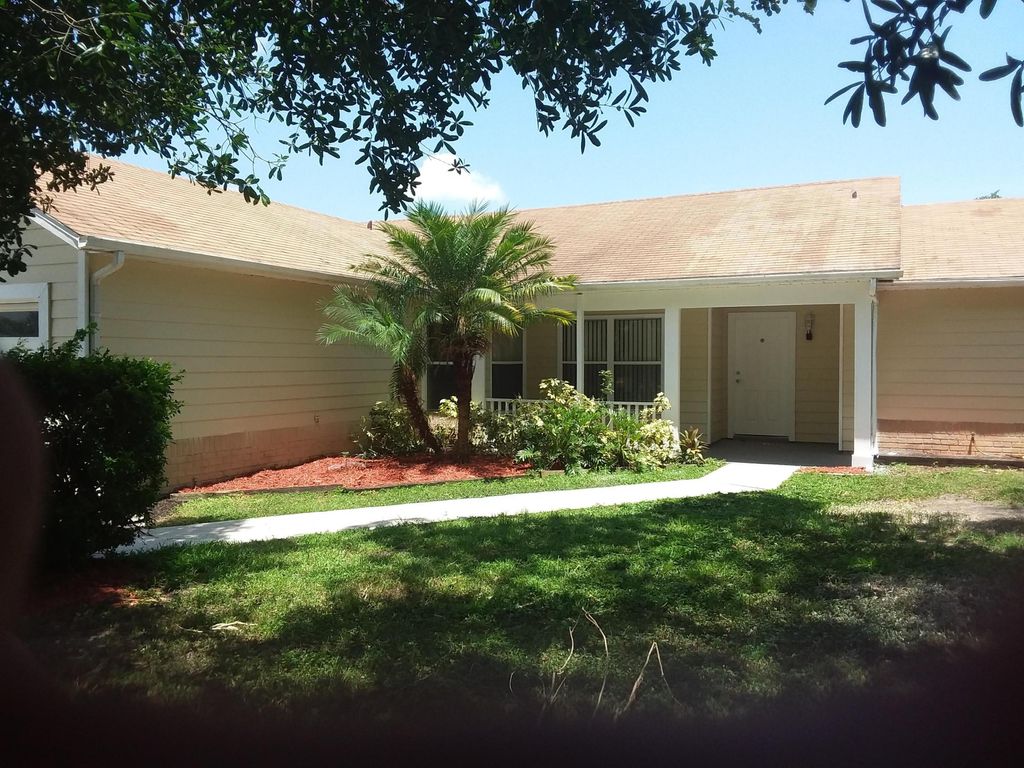 Photo of 161 SW Grimaldo Ter, Port Saint Lucie, FL 34984 (MLS # B26016758)