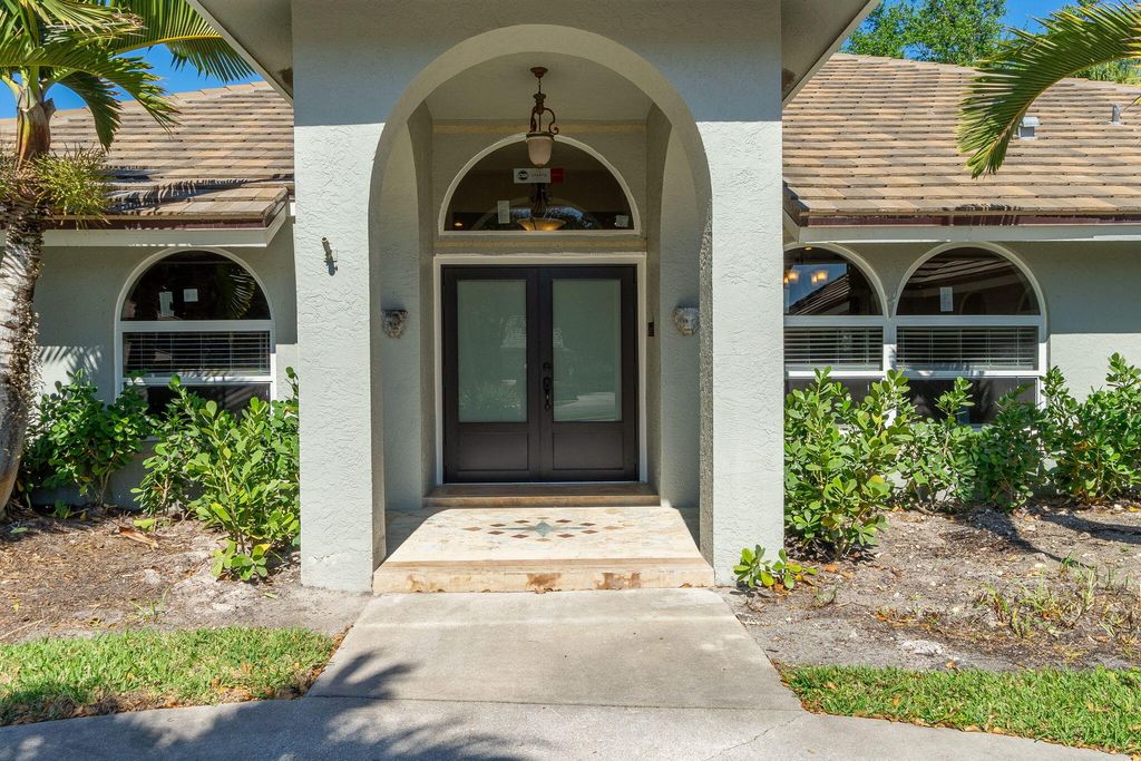 Photo of 8571 Whispering Oak Way, West Palm Beach, FL 33411 (MLS # R11066768)