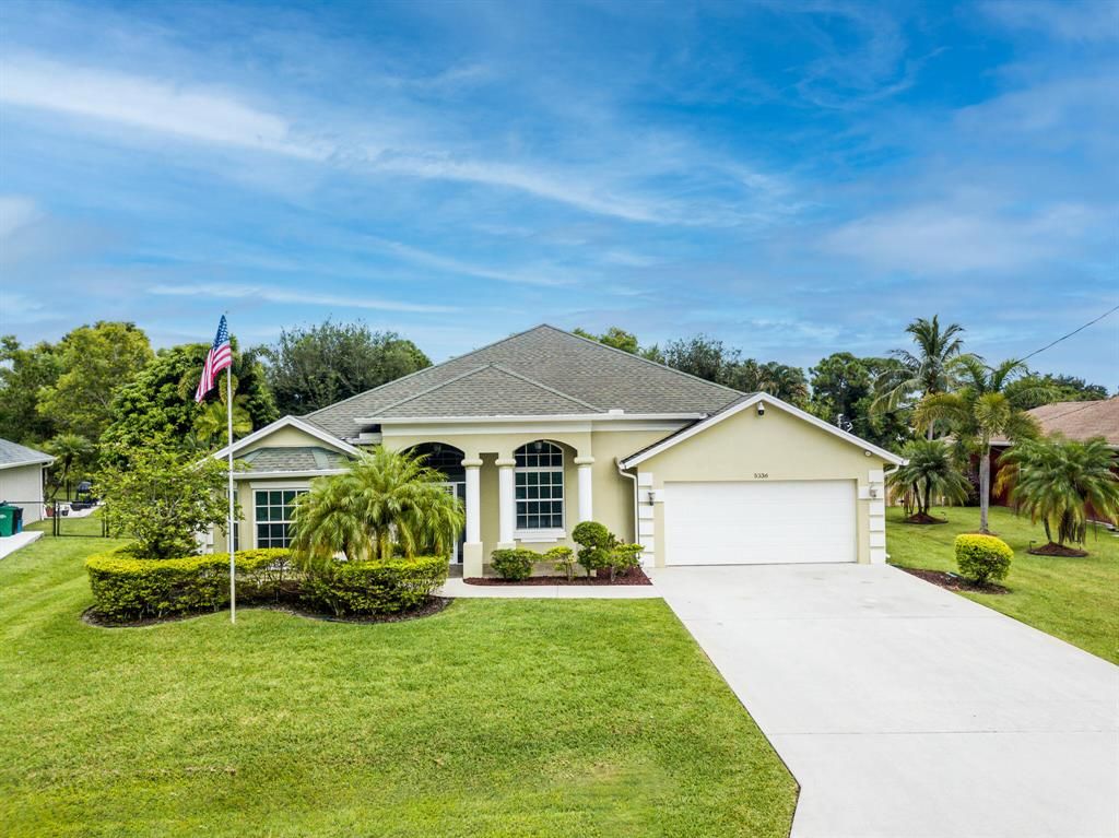 Photo of 5336 NW Clark Avenue, Port Saint Lucie, FL 34983 (MLS # R10747706)