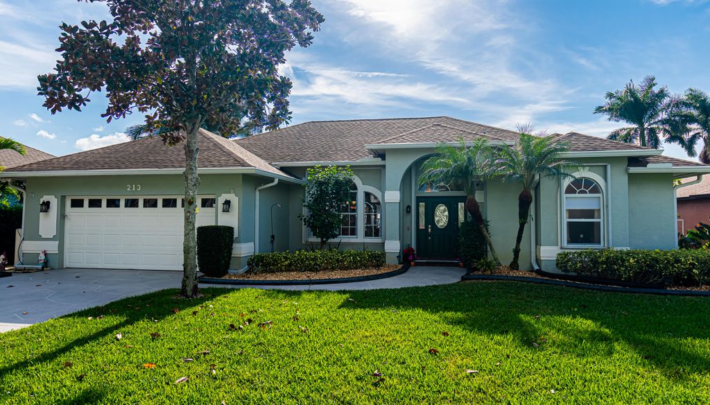 Photo of 213 SW Whitewood Drive, Port Saint Lucie, FL 34953 (MLS # R10870835)