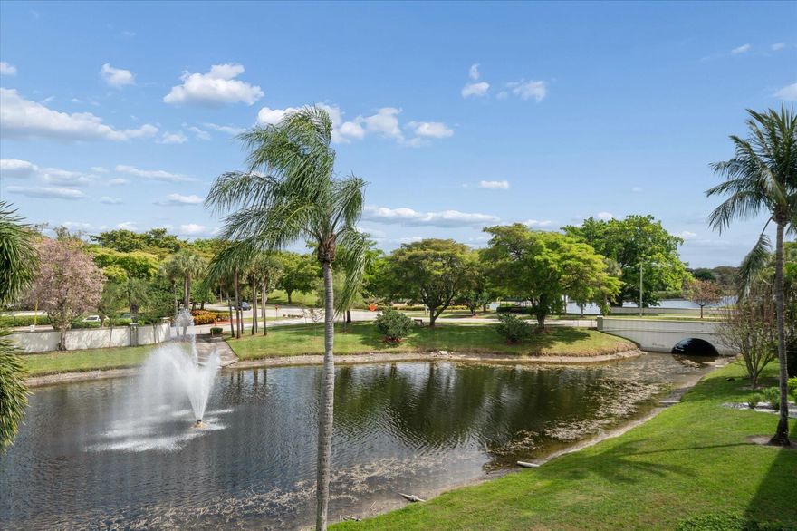 WOW! Unobstructed water and fountain views steal the show in this beautifully maintained condo in desirable Antigua Village/Wynmoor. Light filled and inviting, the spacious layout features beautiful white tile floors thru out living areas, a bright white interior, and elegant plantation shutters. The updated kitchen offers white cabinetry, stainless steel appliances and breakfast area, opening to the living and dining areas. Perfect for relaxing or entertaining. Slide open the doors to the expansive screened patio and enjoy serene lake and fountain views creating a peaceful indoor/outdoor living space. Spacious bedrooms include a primary suite with walk in closet and patio access. Life in Wynmoor means enjoying exceptional amenities: Theater, clubhouse, pickleball, tennis, clubs & more!