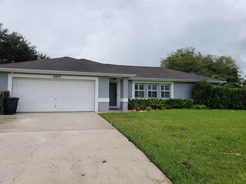 Photo of 8902 SW Avocado Lane Ln, Stuart, FL 34997 (MLS # R10822292)