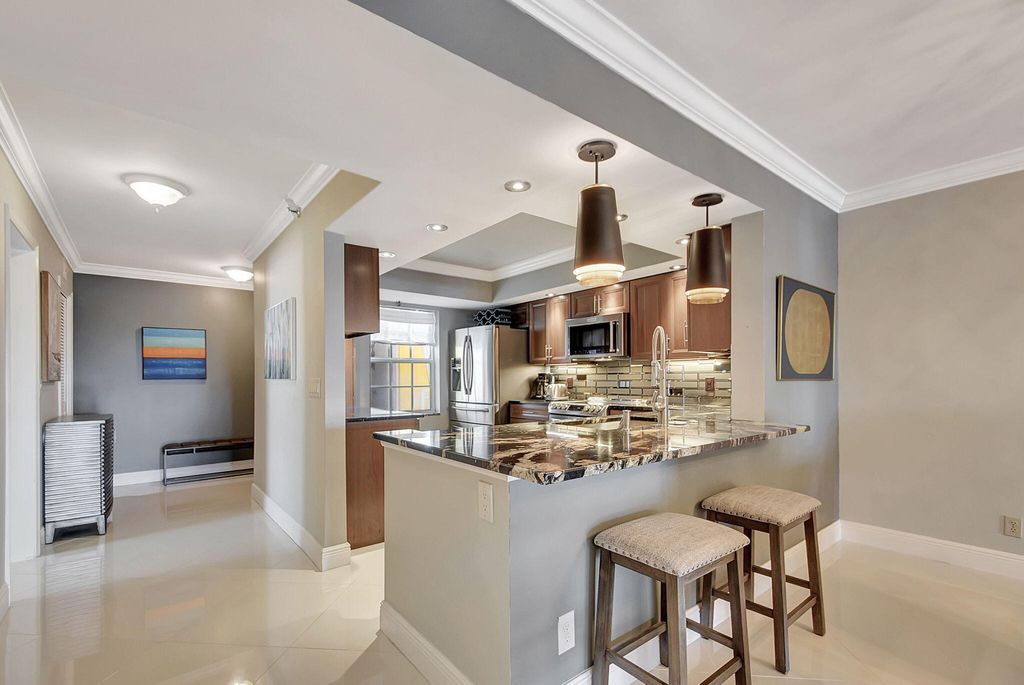 Photo of 300 Jfk Drive #Ph8, Atlantis, FL 33462 (MLS # R10982269)