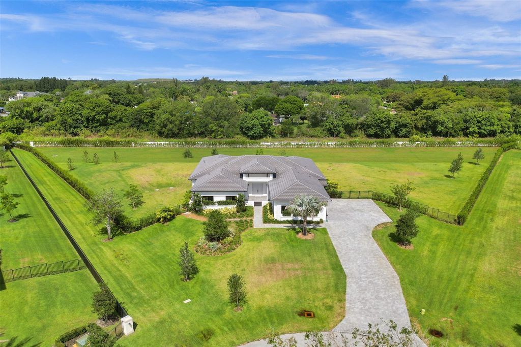 Photo of 17820 Rolling Oaks Estates Drive, Southwest Ranches, FL 33331 (MLS # F10443460)