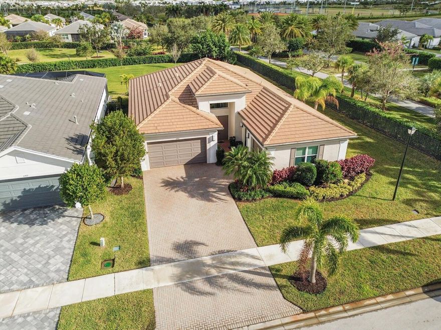 Welcome to Riverland, where luxury resort-style living is like no other in Port St Lucie! The Caroline is one of Riverland's most popular models and perfect for entertaining. This beautiful home has a gorgeous expansive eastern garden view from the back patio and features numerous upgrades. This premier oversized lot is located at the end of the street with its own entrance to the 2-lane scenic landscaped miles long Paseo for golf carts, biking and walking. The amenities include a 34,000 sq ft clubhouse with stunning resort-style pool, restaurant, amazing live entertainment, dozens of clubs; a 24-acre fitness campus w/ a state-of-the-art gym, 3 outdoor pools and 1 indoor pool; learn to cook, paint, or even create pottery at the arts and culture center; The brand new