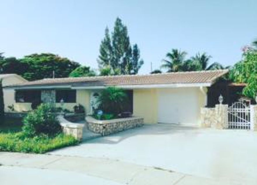 E BOCA!! LOCATION,LOCATION,LOCATION!! HIGHLY SOUGHT AFTER COMMUNITY CLOSE TO FAU. Beautifully upgraded spacious 4 BR/3 BA/1 car garage pool home. New kitchen w/dark wood cabinets, granite & stainless steel appliances. Pass thru window to dining area. Huge master bedroom w/walk-in closet. Master bath has a large step down shower. Split floor plan. Tile in main living areas & wood laminate in bedrooms. Crown molding & wood framed windows throughout. Skylights for extra light. Over-sized private fenced in backyard w/one of a kind wood burning BBQ & fruit trees--Mango, Peach, Avocado, Passion fruit. Newer roof. A-Rated schools. No HOA!! Close to Boca's magnificent beach,Parks,Gumbo Limbo Nature Center. A short drive to Mizner Park & Downtown Delray, dining, shopping, I-95.Hurry before its gone