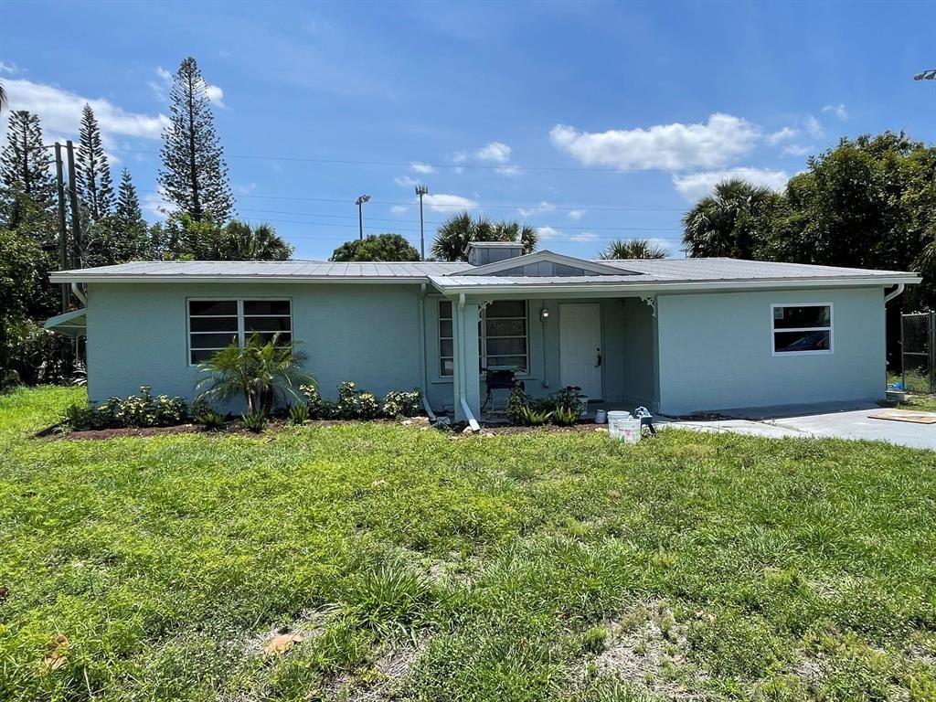 Photo of 2265 NE Arch Street, Jensen Beach, FL 34957 (MLS # R10901502)