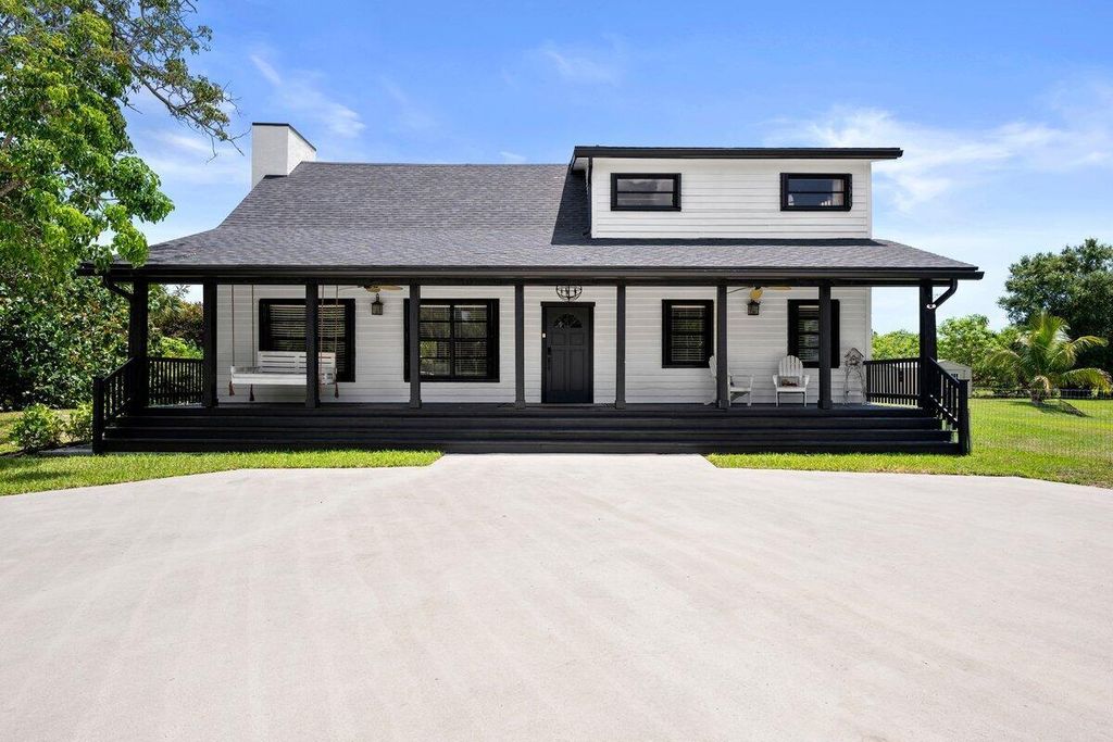 Photo of 15338 97th Drive N, Jupiter, FL 33478 (MLS # R11101724)