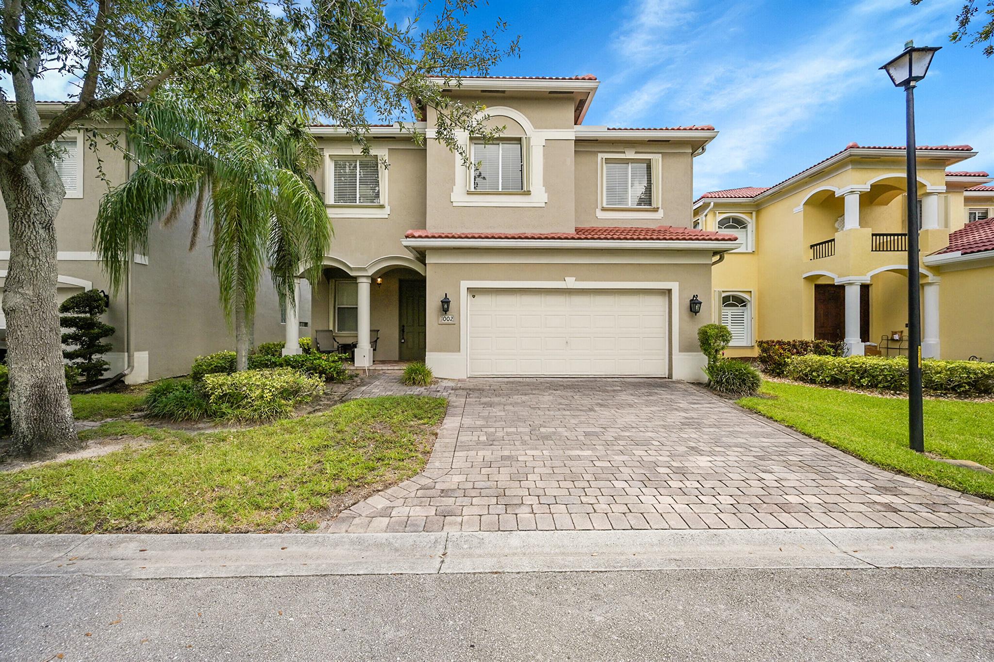Beautifully maintained 5-bedroom, 3.5 bath single-family pool home located in the highly desirable Thousand Oaks gated community in Riviera Beach. This spacious residence features an open layout, ideal for family living and entertaining, with a private pool overlooking peaceful lake views.Situated in a family-friendly community with 24-hour manned gate security, residents enjoy access to premium amenities including a clubhouse, fitness center, tennis courts, basketball court, resort-style pool, multiple playgrounds, and more.Centrally located just minutes from Riviera & Singer Island Beach, fine shopping and dining, major highways, and Palm Beach International Airport. This home offers the perfect blend of comfort, security, and convenience.Schedule your private showing today!