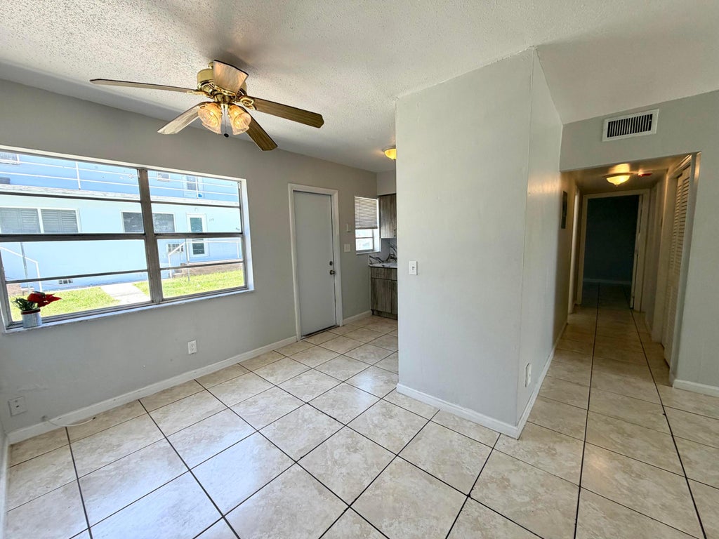 Photo of 915 NE 8th Street #104, Hallandale Beach, FL 33009 (MLS # B26060295)