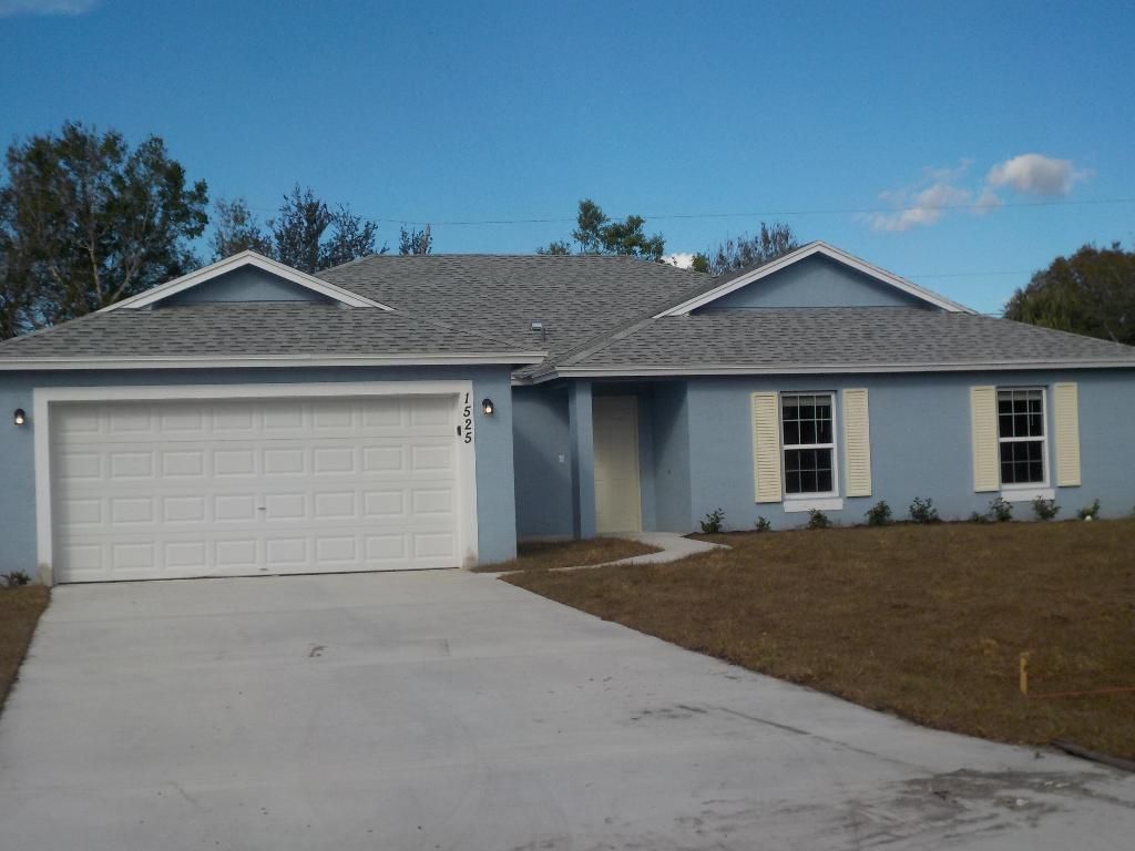 Photo of 3773 SW Swope Street, Port Saint Lucie, FL 34953 (MLS # R10949141)
