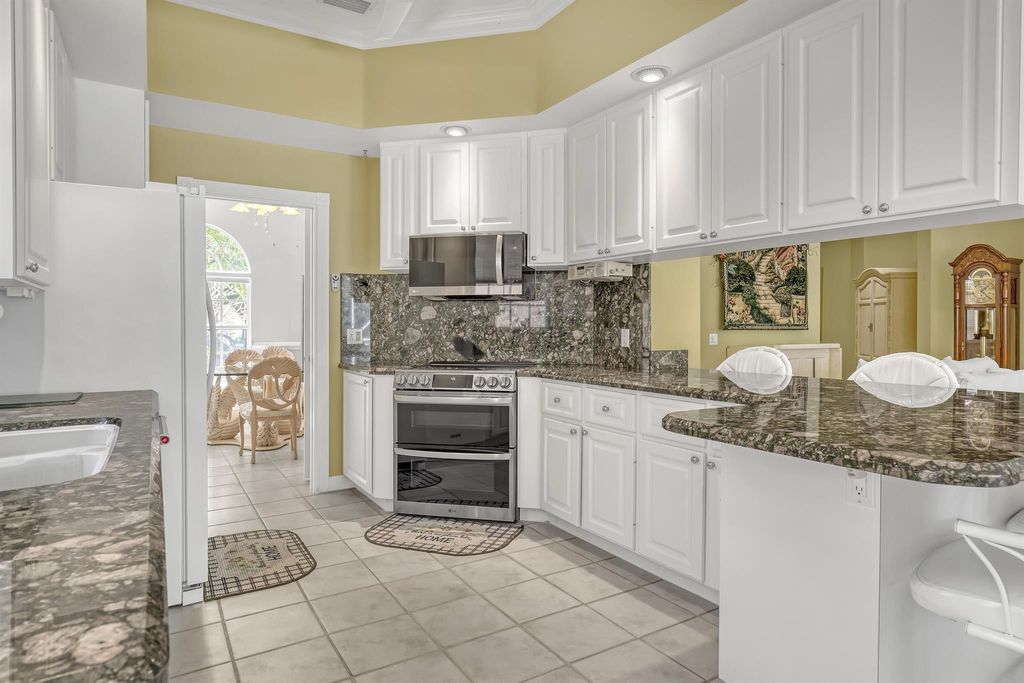 Photo of 4781 Preserve Drive, Delray Beach, FL 33445 (MLS # R11130040)