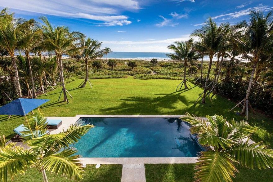 Rare & Spectacular 2.5+ Acres Direct Oceanfront on the North End Dunes with deep sandy beach. Furnished Grand Manor Home w/5BR/6Ba & stand-alone 4BR/4Ba guest house. Large proportion rooms, high ceilings, 1st & 2nd floor master suites, game room, club room & pub, media room, gym, wine storage & enoteca, east & west facing pools, outdoor kitchen, elevator, generator. 12+ car garage.