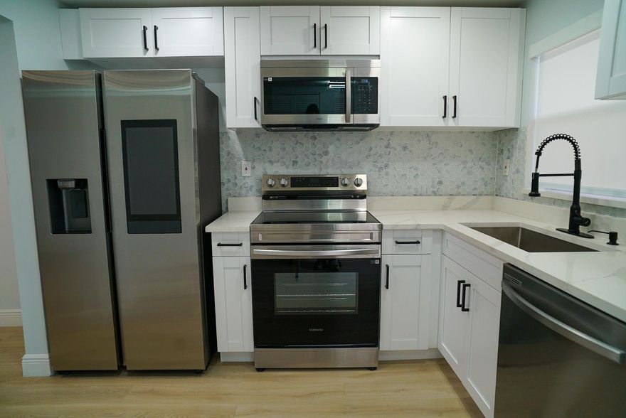 Completely remodeled 2/2 condo, 850 sqft, in highly desirable Sunrise Lakes! Featuring brand-new LVP flooring, elegant Italian tile bathrooms, and a smart, modern kitchen with updated cabinetry and appliances. Enjoy a vibrant 55+ community with resort-style amenities including pools, fitness centers, tennis courts, clubhouse, and weekly social activities. Conveniently located near shopping, dining, golf, and major highways. Move-in ready and designed for comfort & style!