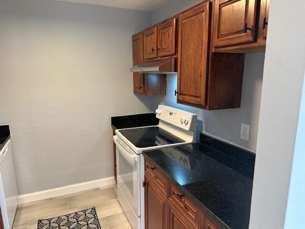 Photo of 3136 Evergreen Lane, Lake Worth, FL 33461 (MLS # R10966859)