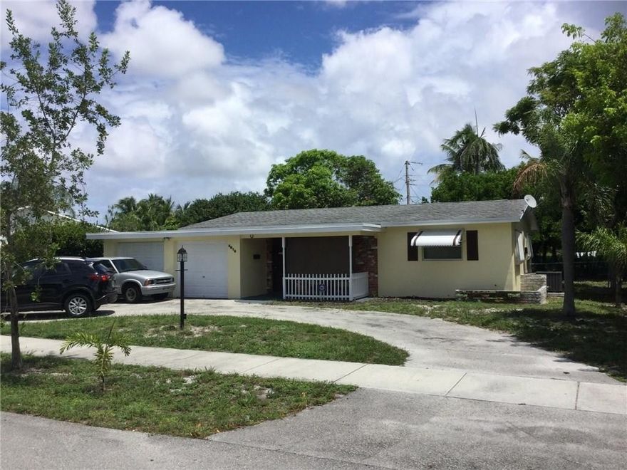 HURRY!  Single Family Home with a Two Car Garage in East Pompano Beach for under $150K.  Two Bedrooms, One Updated Full Bath, Newer Roof and A/C, Circular Driveway and a HUGE backyard to create your paradise!  Needs TLC, great potential.  Only minutes to downtown, restaurants and the sandy beaches.