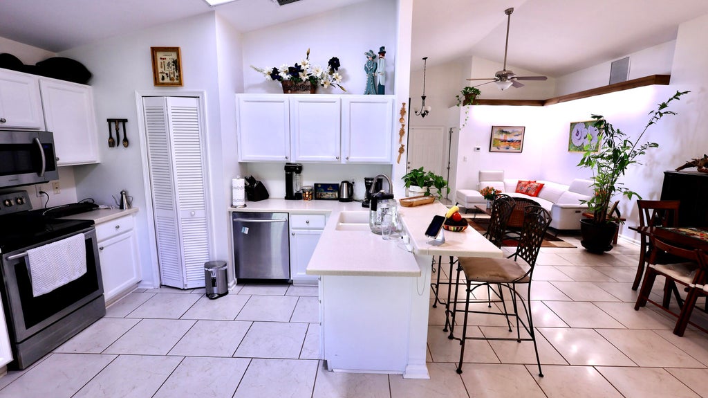 Photo of 2220 Soundings Court, Greenacres, FL 33413 (MLS # B26081199)