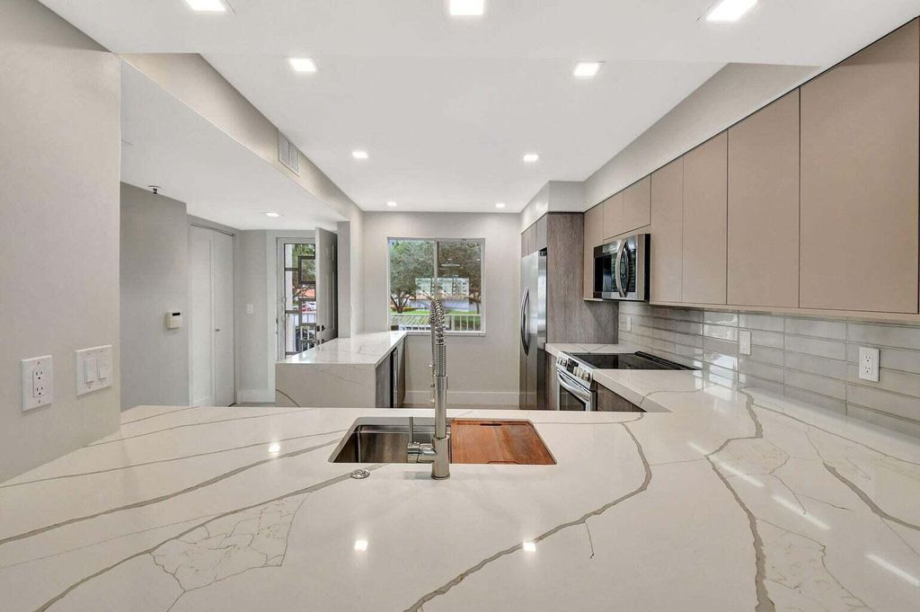 Photo of 14095 Royal Vista Drive #202, Delray Beach, FL 33484 (MLS # R11112753)