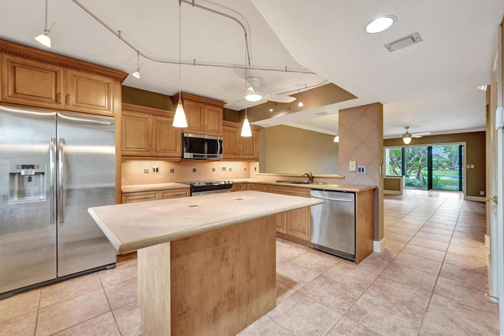 Photo of 2200 S Cypress Bend Drive #102, Pompano Beach, FL 33069 (MLS # F10474307)