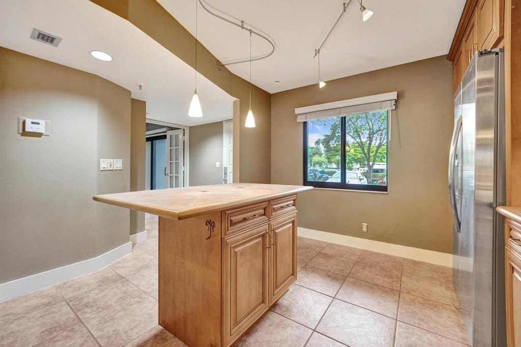 Photo of 2200 S Cypress Bend Drive #102, Pompano Beach, FL 33069 (MLS # F10474307)