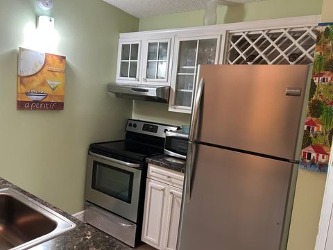 Photo of 2771 Riverside Drive #213-A, Coral Springs, FL 33065 (MLS # F10549547)