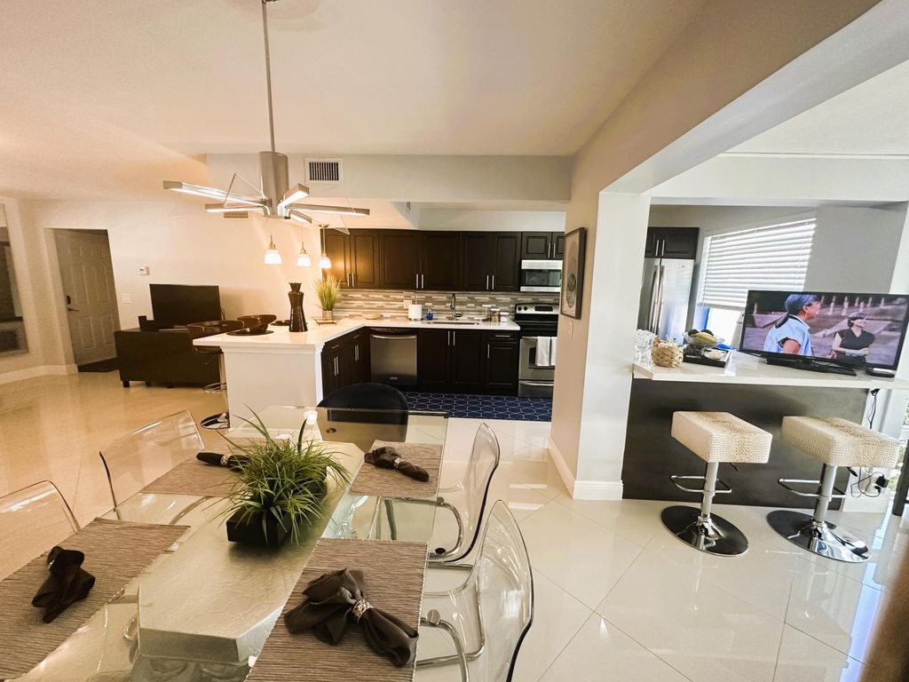 Photo of 34 Colonial Club Drive #202, Boynton Beach, FL 33435 (MLS # R11015439)