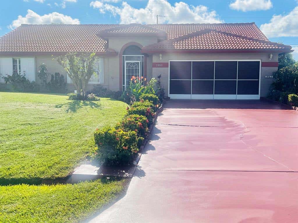 Photo of 2880 SW Ann Arbor Road, Port Saint Lucie, FL 34953 (MLS # R10752384)
