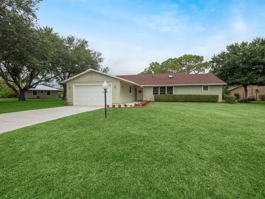 Photo of 1747 SW Belgrave Terrace, Stuart, FL 34997 (MLS # R10724649)