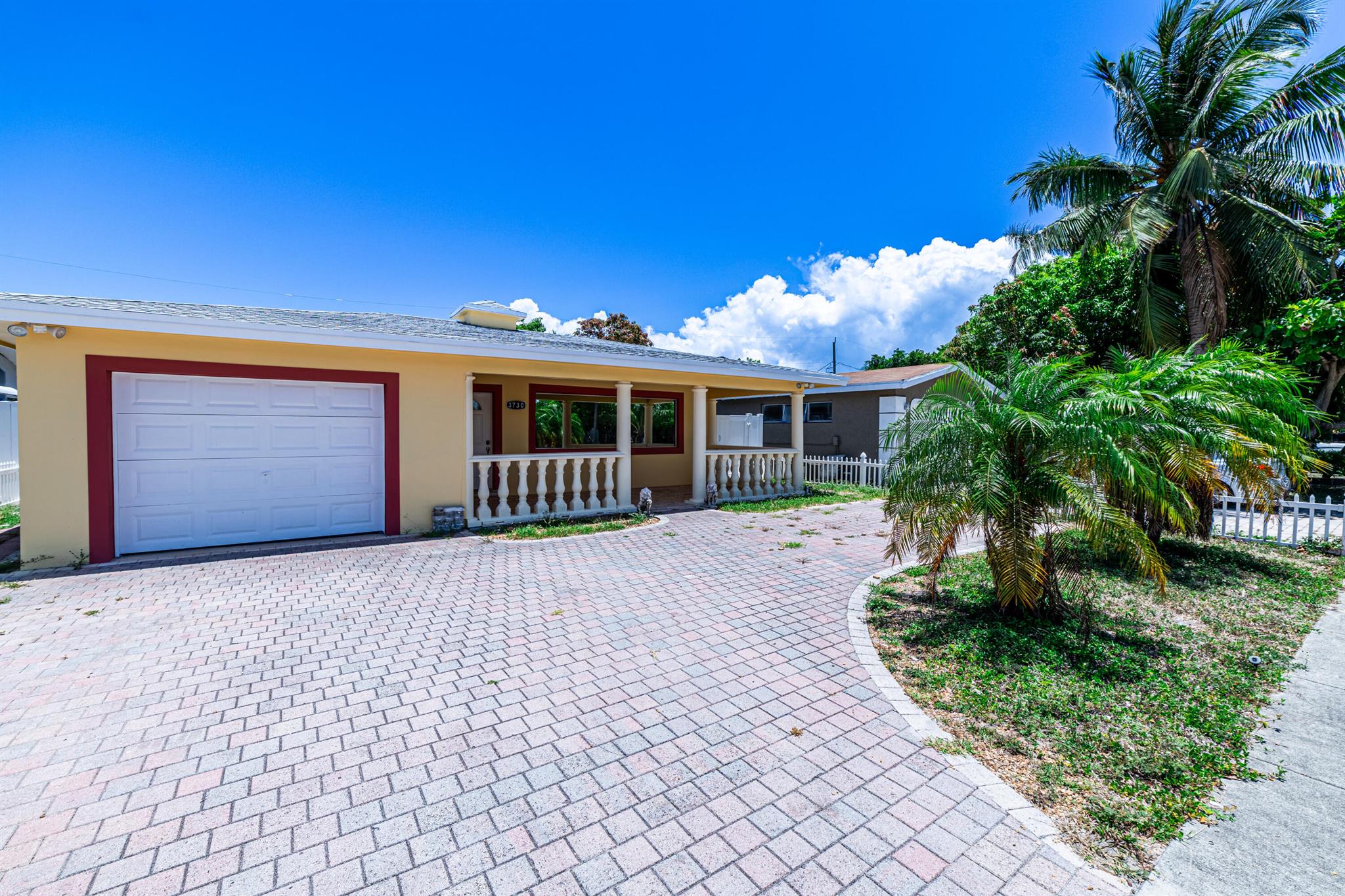 Available Immediately! 24-Hour Approval! This enchanting, newly renovated 4-bedroom, 2-bathroom home features a huge backyard with a patio area. The spacious home includes impact windows, solar panels, a new roof, newer A/C, and a new water heater. It has been freshly painted and is clean, ready for you to move in. With no HOA and easy to show, this home offers tile floors throughout, a lovely kitchen with wood cabinets and stainless steel appliances, and a fully fenced yard. Enjoy a great location with no restrictions, just few minutes away from the beach and shopping only 2 minutes from your front door. Don't miss this opportunity!