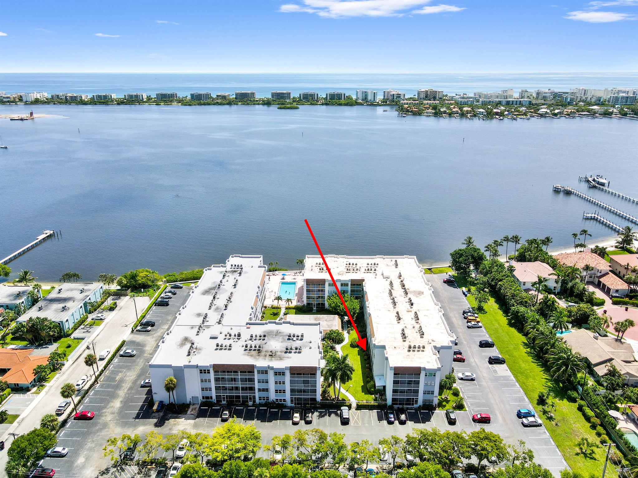 Escape to a life of tranquility and endless activity in this delightful condo, perfectly nestled in the heart of the Palm Lake community. Enjoy the convenience of being located between historic downtown Lake Worth Beach and downtown Lantana, both offering bridge access to miles of beautiful, sandy beaches. This fabulous bottom-floor unit offers unparalleled convenience, with a private beach perfect for launching your canoe or kayak--all just steps from your front door. The home itself is light and bright, featuring modern updated tile flooring, impact windows and doors, a tastefully updated bathroom, and an updated kitchen with sleek granite countertops and stainless steel appliances.