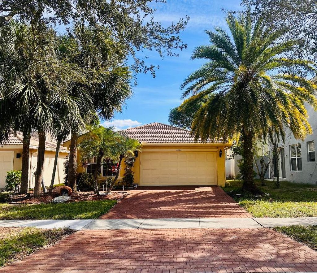 Photo of 5200 Rising Comet Lane, Greenacres, FL 33463 (MLS # R11137124)