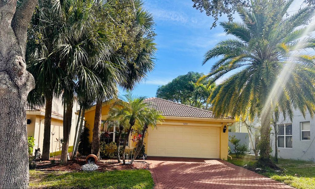 Photo of 5200 Rising Comet Lane, Greenacres, FL 33463 (MLS # R11137124)