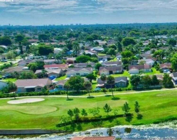 Enjoy your mornings with a stunning golf course view from your patio!Gorgeous home overlooking the golf course near shops and expressways, this property has been totally redone and it offers a great Florida living experience! One level property with no carpets, all tiled flooring, smooth ceilings, LED lighting with stunning views and impact windows. Easy approval process for a quick move in. Move in with only 1st month and security deposit!!