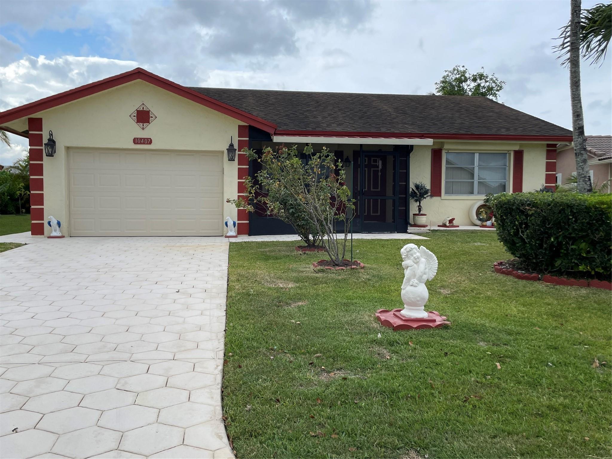Spacious 2-bedroom, 2-bathroom single family home at the Isles of Tamarac's Westwood Community 7. This house offers an open floor plan with abundant natural light and title flooring; the upgrade kitchen boasts granite countertop and eat-in kitchen area. The master bedroom has walk-in closet and walk-in shower. Second bedroom as a great size as well, and a combination of shower and bathtub bathroom. In addition, it has a big screen patio and a recent redone good sized one car garage flooring with washer and dryer in it. This house has been well kept, is fresh painted, the electrical panel is recently upgraded, new driveway with plenty room for parking.
THIS IS A 55+ COMMUNITY WITH LOW HOA. BRING YOUR BEST OFFER, SELLER WILLING TO CONCIDER A REASONABLE OFFER. BY APPOINTMENT ONLY.