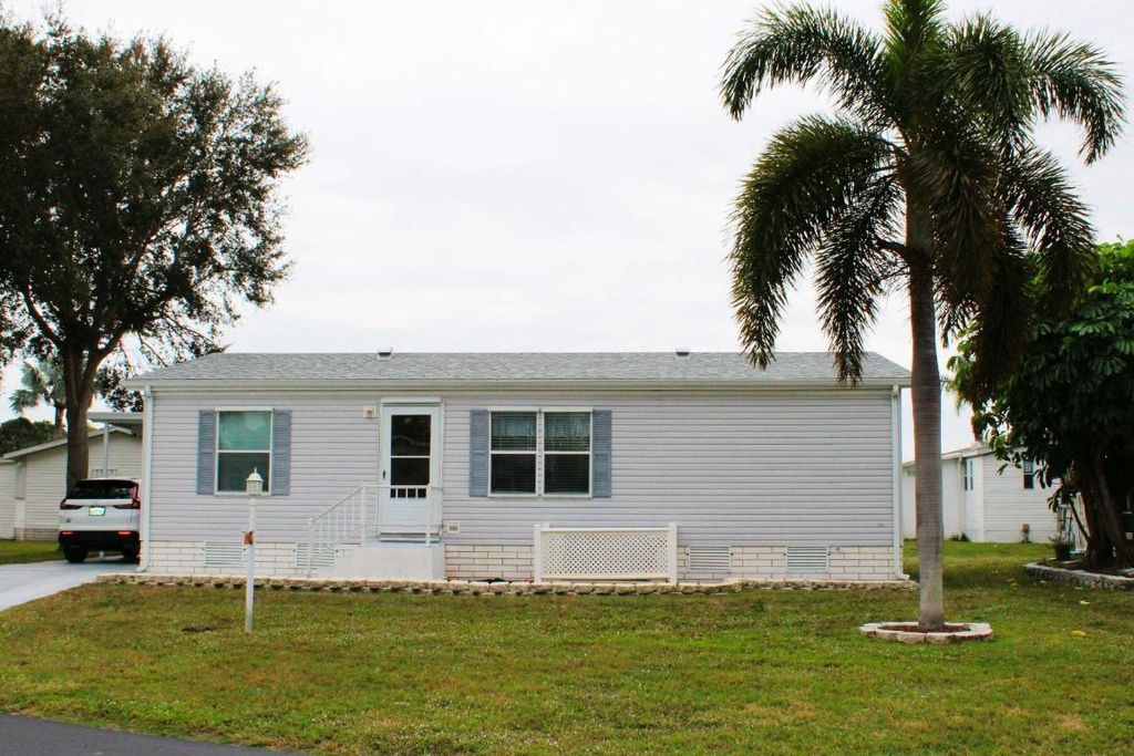 Photo of 379 Tropical Isles Circle, Fort Pierce, FL 34982 (MLS # R11054278)