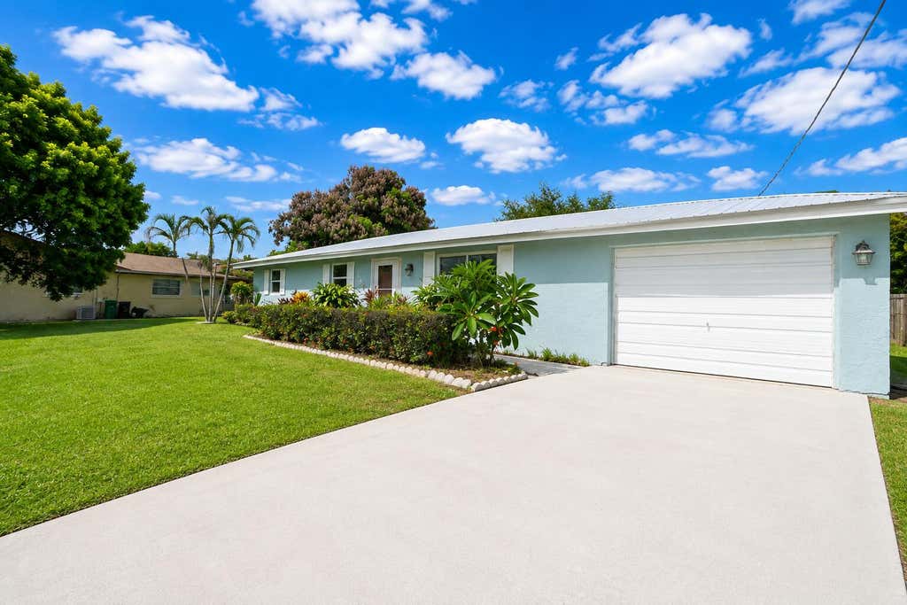 Photo of 2485 SE SIDONIA Street, Port Saint Lucie, FL 34952 (MLS # B26062233)
