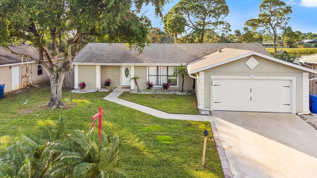 Photo of 109 Timber Run W, Riviera Beach, FL 33407 (MLS # R11050852)