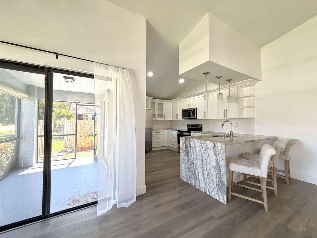 Photo of 9912 61st Way #A, Boynton Beach, FL 33437 (MLS # F10554239)