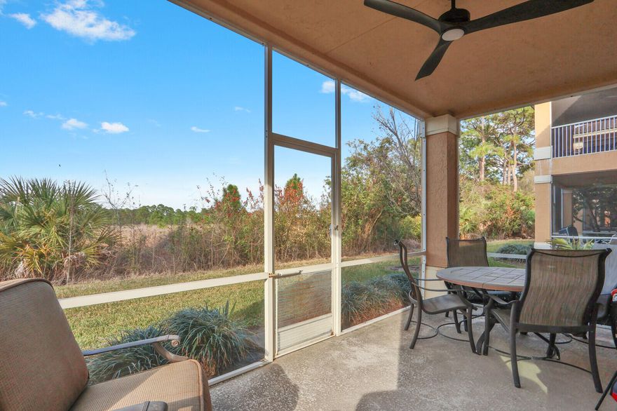 Whether you're seeking a smart investment, a vacation getaway or a versatile primary residence, this golf villa delivers unmatched adaptability in a beautiful, resort-style setting. This ground-floor corner unit offers privacy & serene preserve views backing to the Pete Dye golf course. HURRICANE IMPACT WINDOWS & DOORS provide peace of mind, while newer appliances, A/C & water heater ensure modern comfort & efficiency. Offered fully furnished, this 2 BR, 2.5 bath villa is tastefully decorated, meticulously cared for & truly move-in ready. Castle Pines residents enjoy their own resort-style pool & hot tub, adding to the stress-free, low-maintenance lifestyle this community is known for.
Located in a true golfer's haven, PGA Village is home to three world-class PGA golf courses & the Legacy a premier private club offering exceptional golf and tennis experiences.

Discover the perfect blend of flexibility, comfort, and investment potential in this thoughtfully designed golf villa--truly two residences in one.

The main unit offers a spacious and inviting layout, featuring a large primary bedroom retreat and 1.5 baths for added convenience. The full kitchen is ideal for preparing everything from casual breakfasts to elegant dinners, flowing seamlessly into the dining and living areas--perfect for entertaining after a day on the course. Generous natural light and open-concept living create a bright, welcoming atmosphere throughout.

Adjoining the main residence is a fully self-sufficient efficiency suite that functions as a private unit of its own. Complete with a separate entrance, its own A/C system, a comfortable bed-sitting area, full bath, and convenient kitchenette, this space provides independence and privacy for guests or tenants.

The unique double locking doors between the two units allow you to customize the layout to suit your needs. Keep them closed to rent both sides individually for maximum income potential. Live comfortably in one unit while generating revenue from the other. Or simply unlock the doors to create an expansive combined retreat--ideal for extended family, visiting friends, or multi-generational living.

Homeownership also includes access to The Island Club, a vibrant community clubhouse featuring a resort-style pool, fitness center, pickleball, tennis, and a full calendar of social activities.  Just outside the gates enjoy everything Florida Living at it's finest has to offer including The Met's Spring Training, dining, shopping, entertainment & everything you need for daily living. Florida's beautiful beaches are just a short car ride away. 

HOA FEES INCLUDE EXTERIOR MAINTENANCE OF THE BUILDING AND LANDSCAPPING, COMMON AREAS, GUARD GATE AND ROOVING SECURITY, INTERNET, CABLE, WATER, SEWER, POOL AND HOT TUB IN CASTLEPINES NEIGHBORHOOD AND USE OF THE ISLAND CLUB AND ALL IT'S AMENITIES!

 Whether you're looking to live where you play, escape the winter chill, or capitalize on a desirable rental opportunity, this exceptional property delivers the best of Florida living!