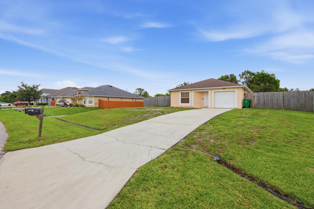 Photo of 4461 SW Jaunt Road, Port Saint Lucie, FL 34953 (MLS # B26030528)